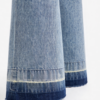 Jeans de pernera ancha con cinturón de lazo en azul claro lavado